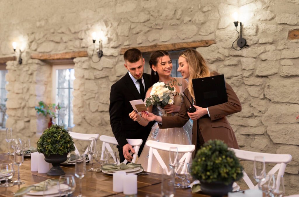 Wedding planners with a couple at the venue